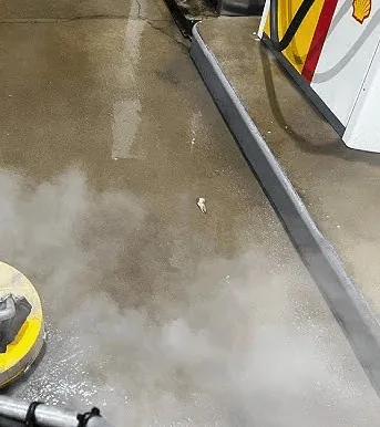 After hot water pressure washing — clean concrete walkway in Proctor, MN